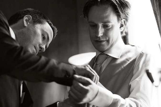 the groom getting ready for his big day